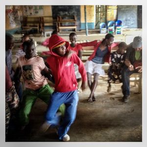 Children dance in a club in Kibera. The Kibera slum is the largest slum in Nairobi with around half a million inhabitants.