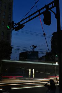 Steel wire illuminated by traffic lights.