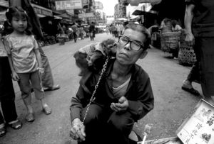 Pedlar with pet monkey