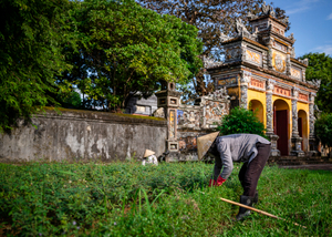 Women tending the garden in the Imperial Citadel of Hue.