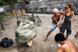 Sacks of metal, iron and tin cans are beaing sold to junkshops.