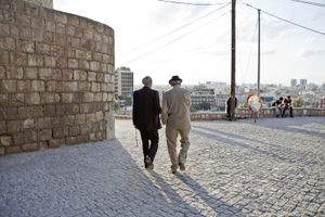 Two befriended old men walk the way down from the Erbil citadel. © Tom Verbruggen