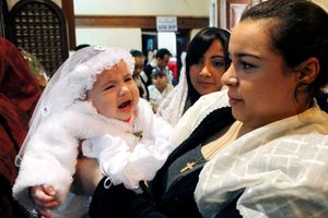baby just after baptism                                                                 The Coptic World © Bert Spiertz