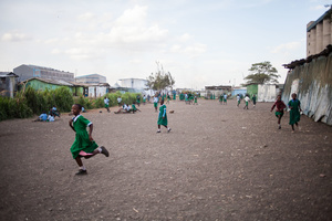 Sinai slum, Nairobi, KENYA, 29.10.2013:  School children play during a break at Jobenpha Community school.