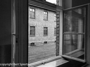 Auschwitz, view through a window in a barrack
