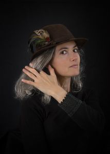 The brown hat...