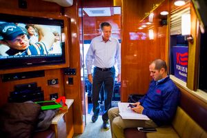 Republican presidential candidate Gov. John Kasich of Ohio boards his campaign bus during a multi-day bus tour through New Hampshire on Wednesday, Oct. 14, 2015.