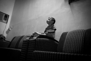 © Christian Werner - Iraq, Basra, 24 April 2012 - Mushin Sadiq (3 years old) lives in the Al-Qibla area in Basrah. Since birth he wasn’t able to use his legs nor his hands. Not even after several operations. Also he is suffering from a celebral tumor.