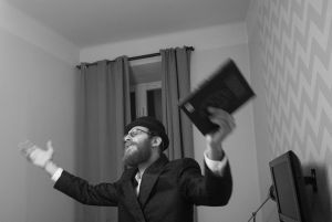 Mike Mandel member of the Chassidic movement praying.