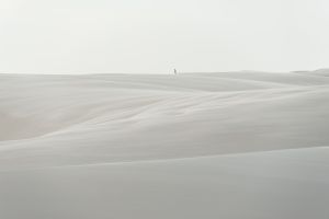 A man on the silky desert
