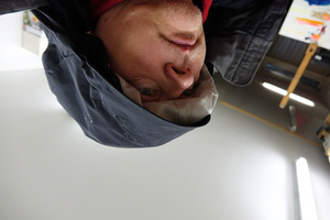 self portrait hooded, with climate change in studio
