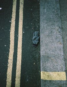 Yellow lines and glove