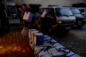 Early Morning action at a cold chain where the Polio vaccine is stored. The vaccination is organized for distribution to various districts in Aligarh, Uttar Pradesh