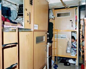 Men living in “coffin rooms”, Mong Kok