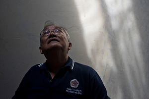 Portraits of survivors and and former political prisoners and relatives of the victims of the 1965 massacres in Indonesia