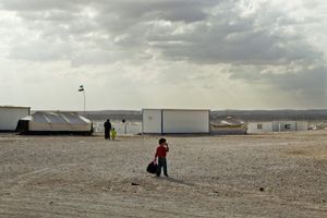 A young boy wandering around in the camp. © Tom Verbruggen