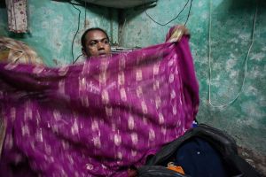 Puja packs for a two day training session organized by The Humsafar Trust.  The training session will be held in a hotel a two hour train journey from Mumbai.  "I'll take my best sari", she said.  © Alison McCauley