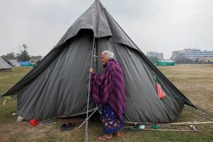 An old woman lives in a makeshift camp who have lost her house in the eartquake at Katmanmdu, Nepal, 7 May 2015