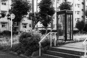 Housing complex with phone booth