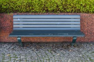 © Pekka NikrusThree benches in front of red marble, Helsinki, 2011