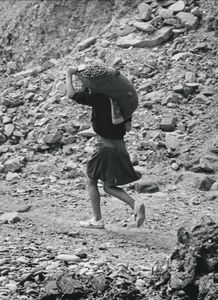Children fishing coal from the sea in the deprived coal minig region near Lota, southern Chile, during the Pinochet years