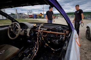 Josh Peck inspects his derby car