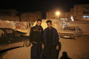 Mohamad and Pouria are two young Kurdish people in their camping area in saffron region