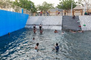 Kids doing some acrobat in the pool