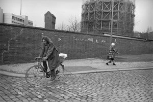 Cyclist with Water Tower