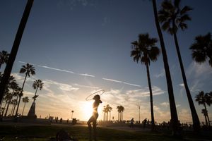 Venice beach Boardwalk, hula-hoop player.