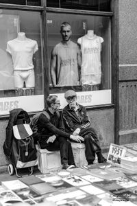 Two old men chatting in Soho