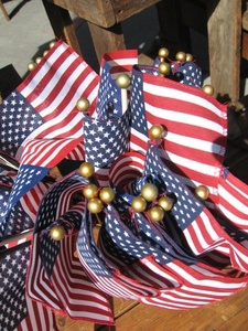 hand flags along the parade route