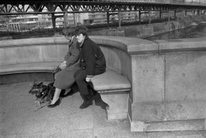 Couple with German Shepherd