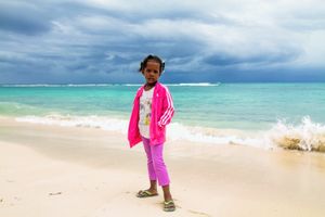 Young girl posing for picture after school