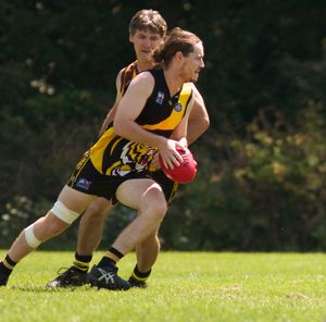 Jed Wheatley moves the ball along