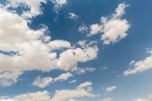The sky over Zaatari Refugee Camp in Jordan. The children of Zaatari are flying kites as life carries on. Refugees in Zaatari RC have access to healthcare and schools but the camp is overcrowded and living conditions are harsh for many. © David Brunetti