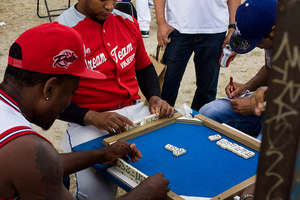Throughout the day many games are played and some prefer distracted playing dominoes.