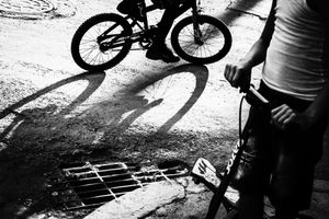 Scooter and bicycle shapes shadows and form. Havana, Cuba
