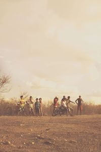 They asked me to take pictures of their friends riding a motorbike.