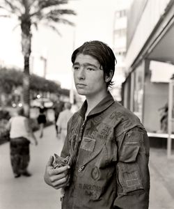 Boy with cat, Lincoln Mall, Miami Beach, Florida.