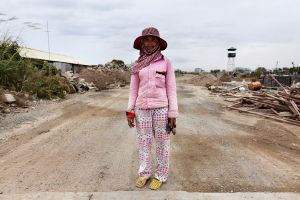Phnom Penh, Cambodia. Jan 2013. Diamond Island. Bricklayer.