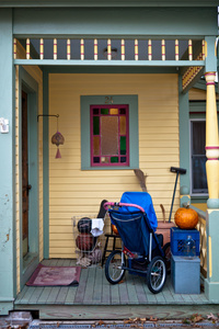 Front porch in spring with children of various ages.