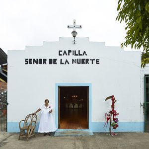 Exterior of the San la Muerte chapel with its custodian in Empedrado village, Corrientes