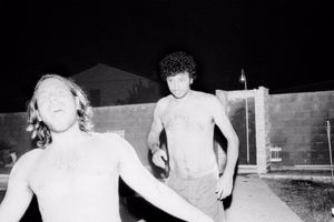 Alessandro and Bob refresh themself on the pool during the night.