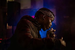 Performing live at a venue in Chippendale, Sydney. Music is a dream and an escape for Cairo.