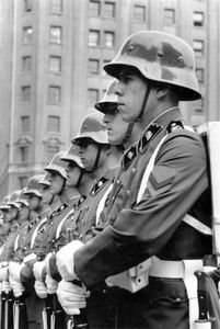 Soldiers on parade displaying Nazi-style helmets during the Pinochet era. Santiago, Chile,1984