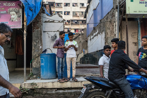 Two boy are looking the smartphone. Mumbai.
