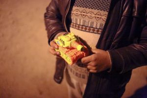 Benefactors while distributing toys to kids