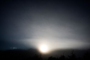Sun rises next to where the Baker River and Nef River float together and one of the dams is planned to be constructed.