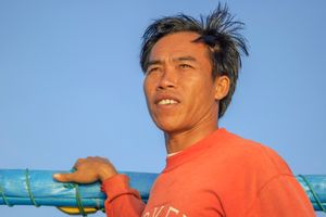 Balinese fisherman in the early morning sun.